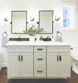 Double vanity with wall-mounted mirrors